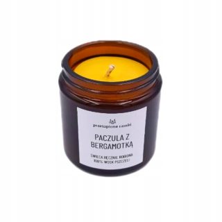 Tradičná sviečka vyrobená z včelí vosk pačuli s roztavenými rámami bergamot